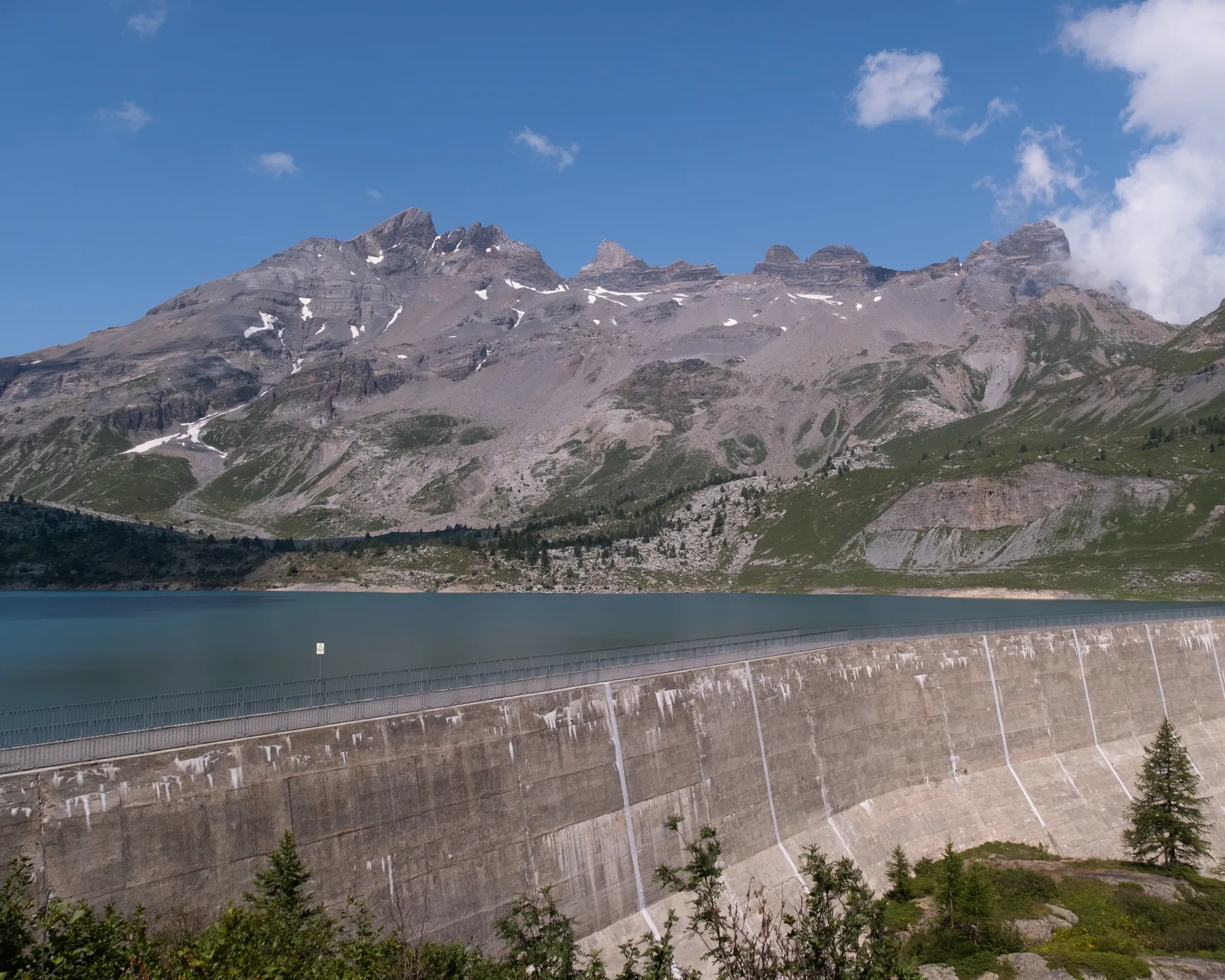 Salanfe dam and lake below the Dents du Midi on the SwissPeaks Trail